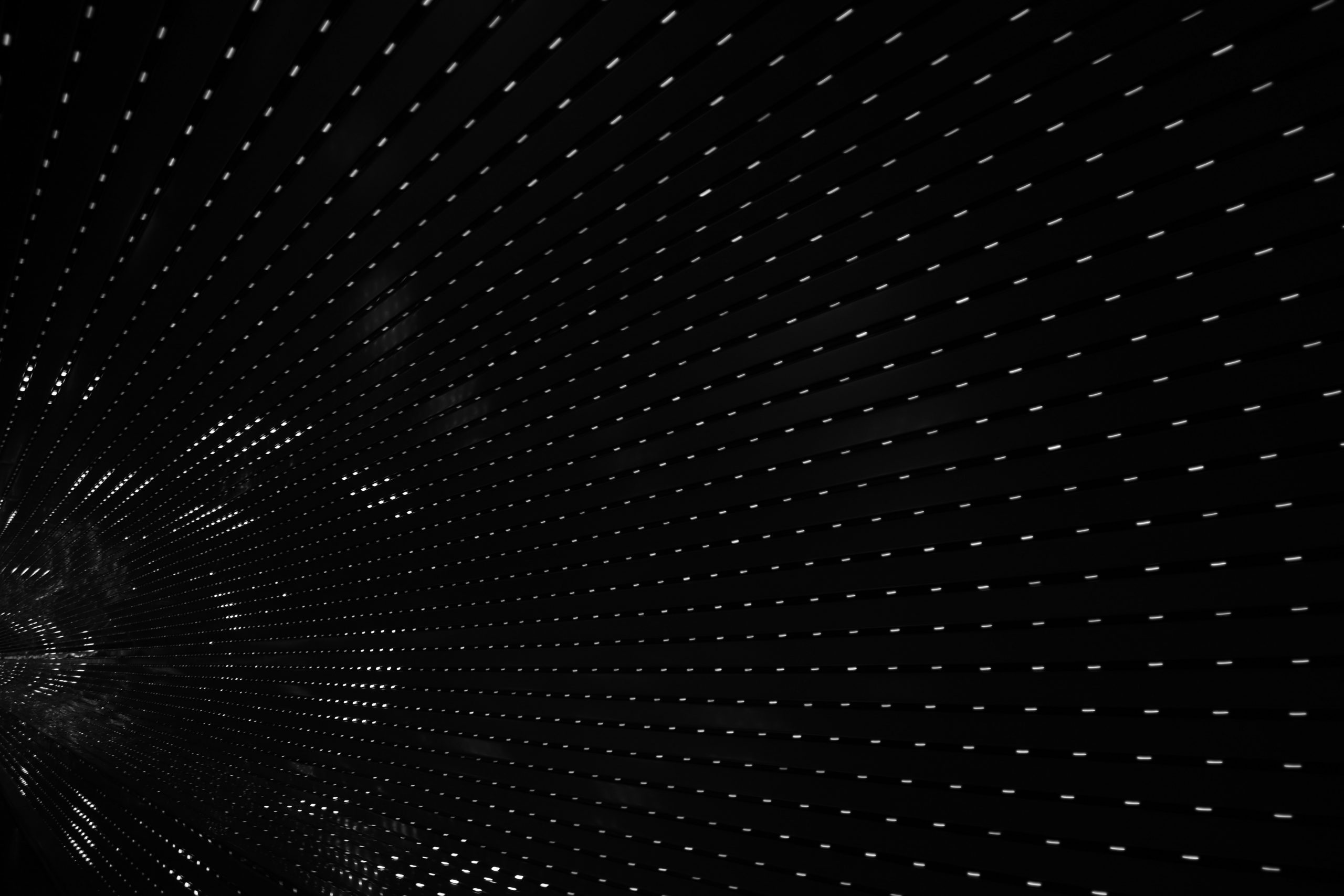 wallpaper Black tunnel interior with white lights