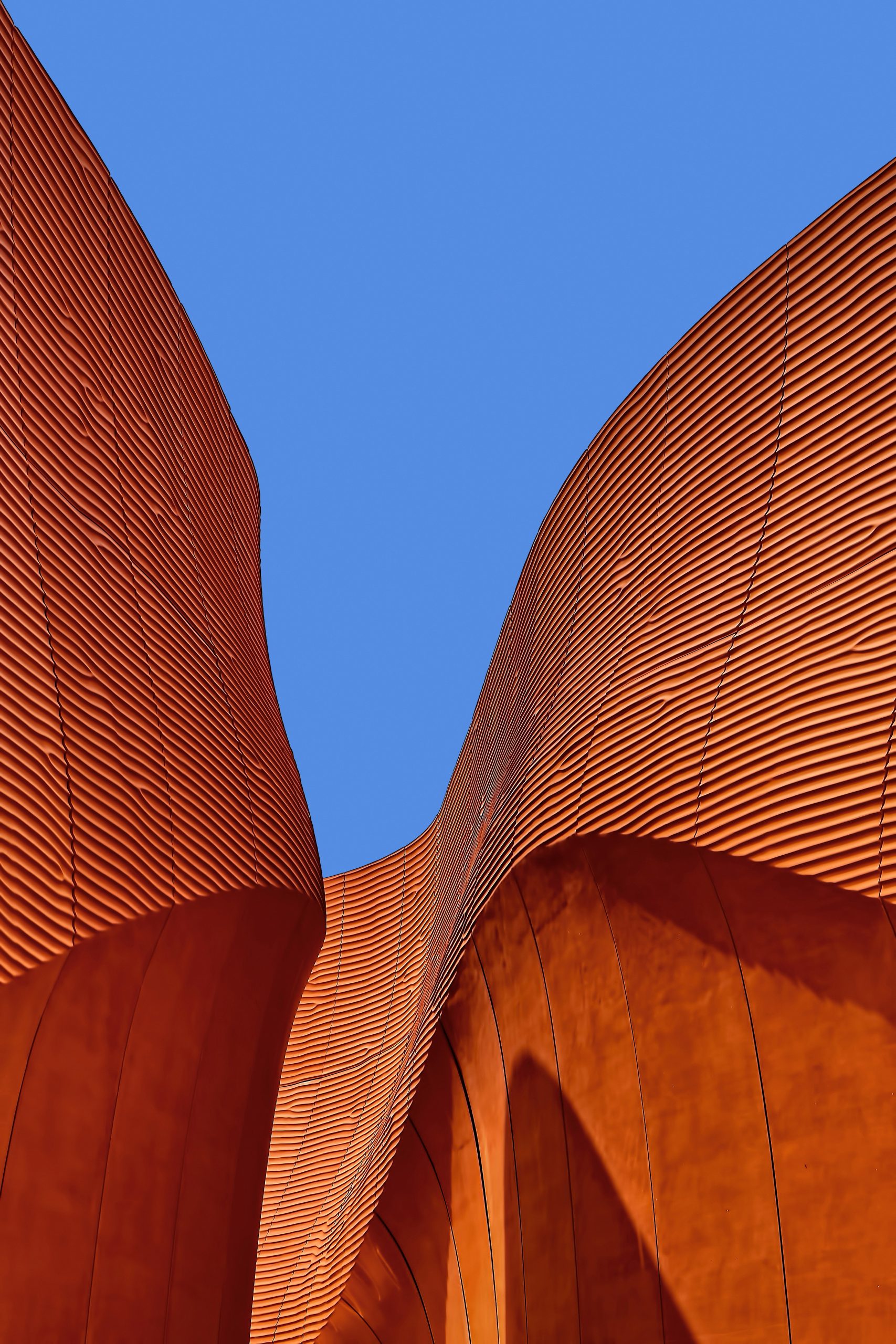 Minimalist photography of brown wavy structure