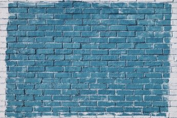 Gray concrete bricks painted in blue