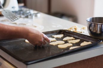 Cookies on baking sheet inside kitchen