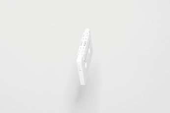 White cassette tape with white background