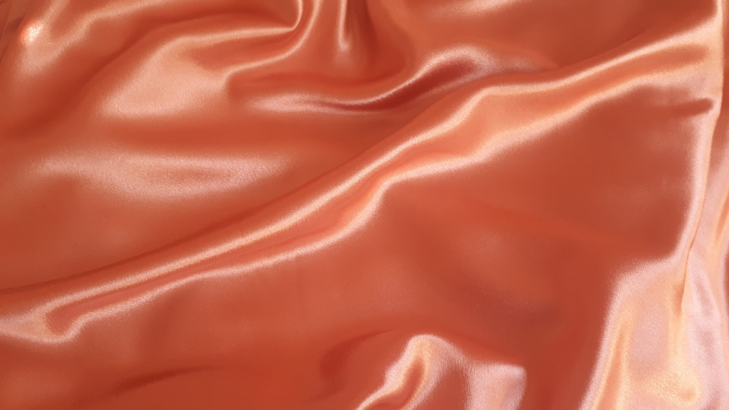 Orange textile wallpaper