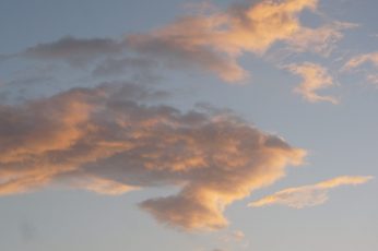 Orange and white clouds wallpaper