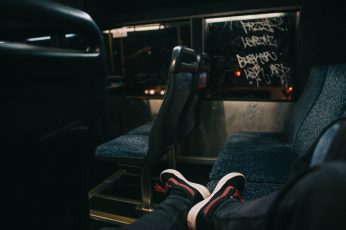 photo of person sitting inside bus