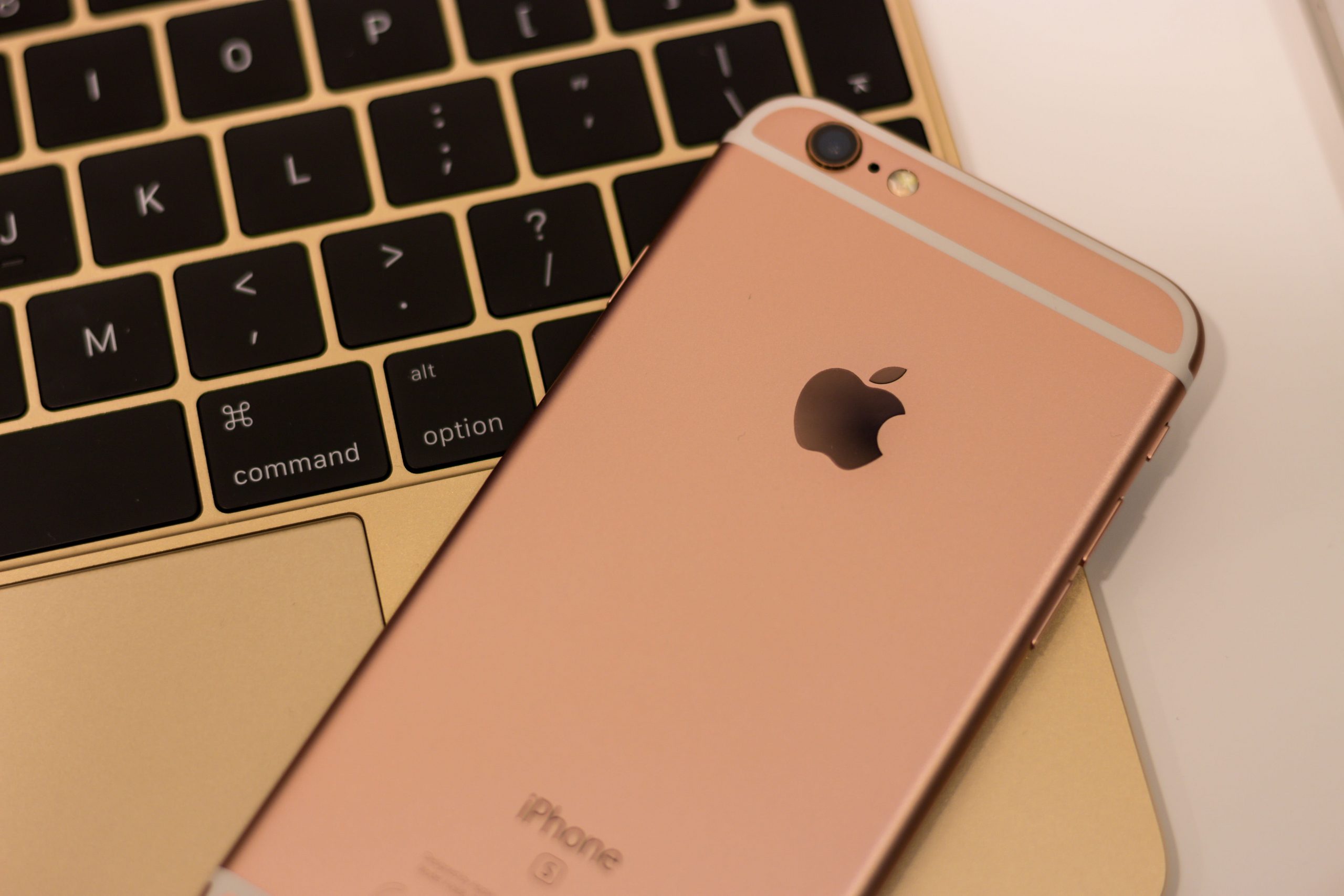 Wallpaper rose gold iPhone 6s on top of 12-inch gold MacBook, apple, macbook 12