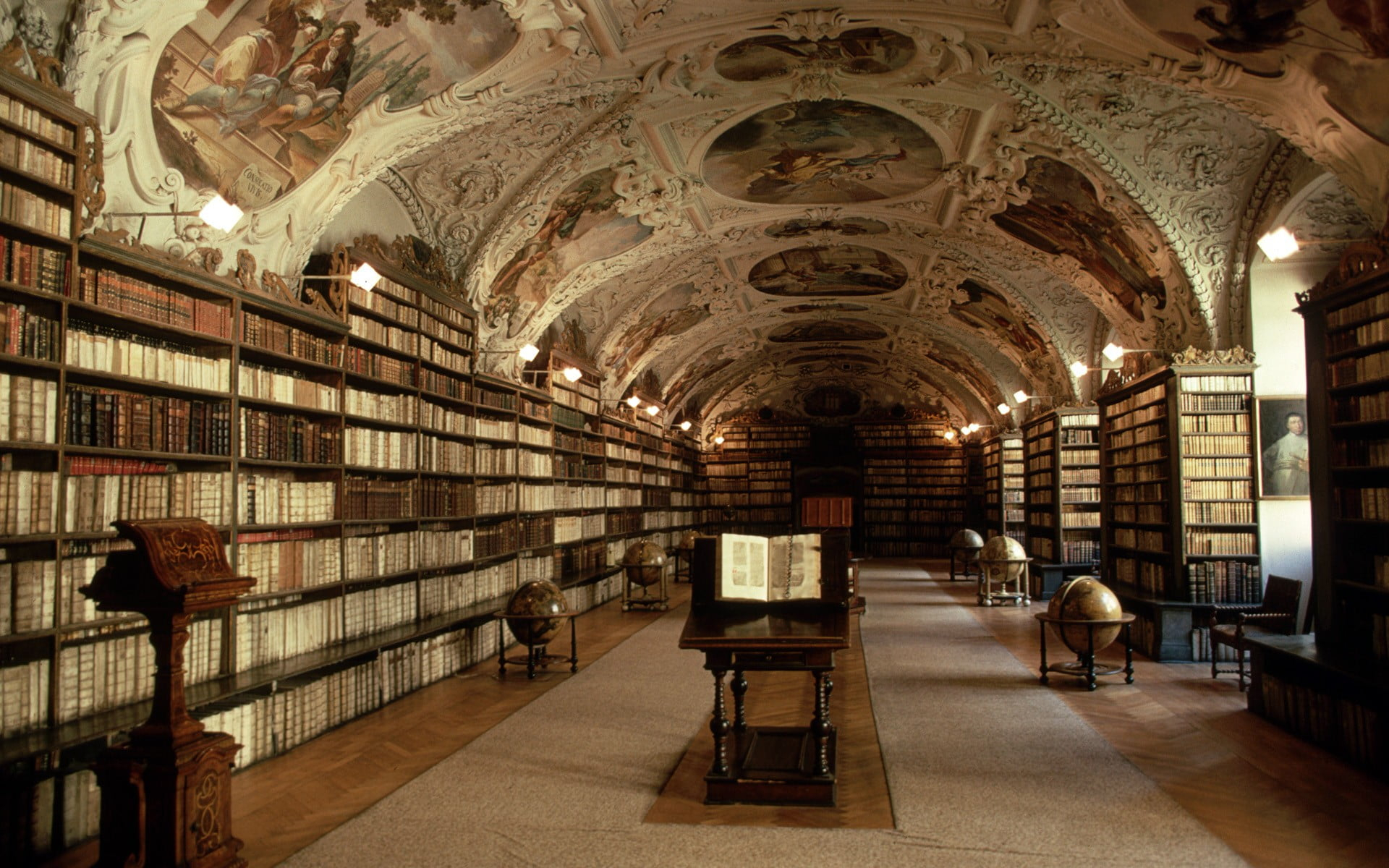 Library interior, books, shelves, globes, Prague, Czech Republic wallpaper