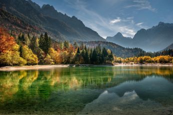 Body of water wallpaper, calm body of water surrounded with trees and mountains