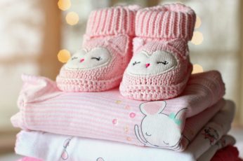 Toddler’s pink knitted boots wallpaper, booties, baby, girl, baby girl