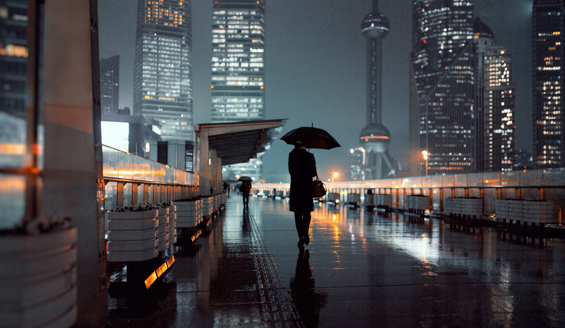 Black umbrella wallpaper, person holding umbrella walking on street during nightime