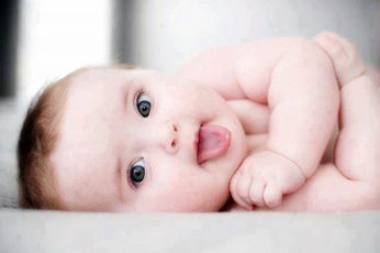 Cute Baby with Tongue out wallpaper
