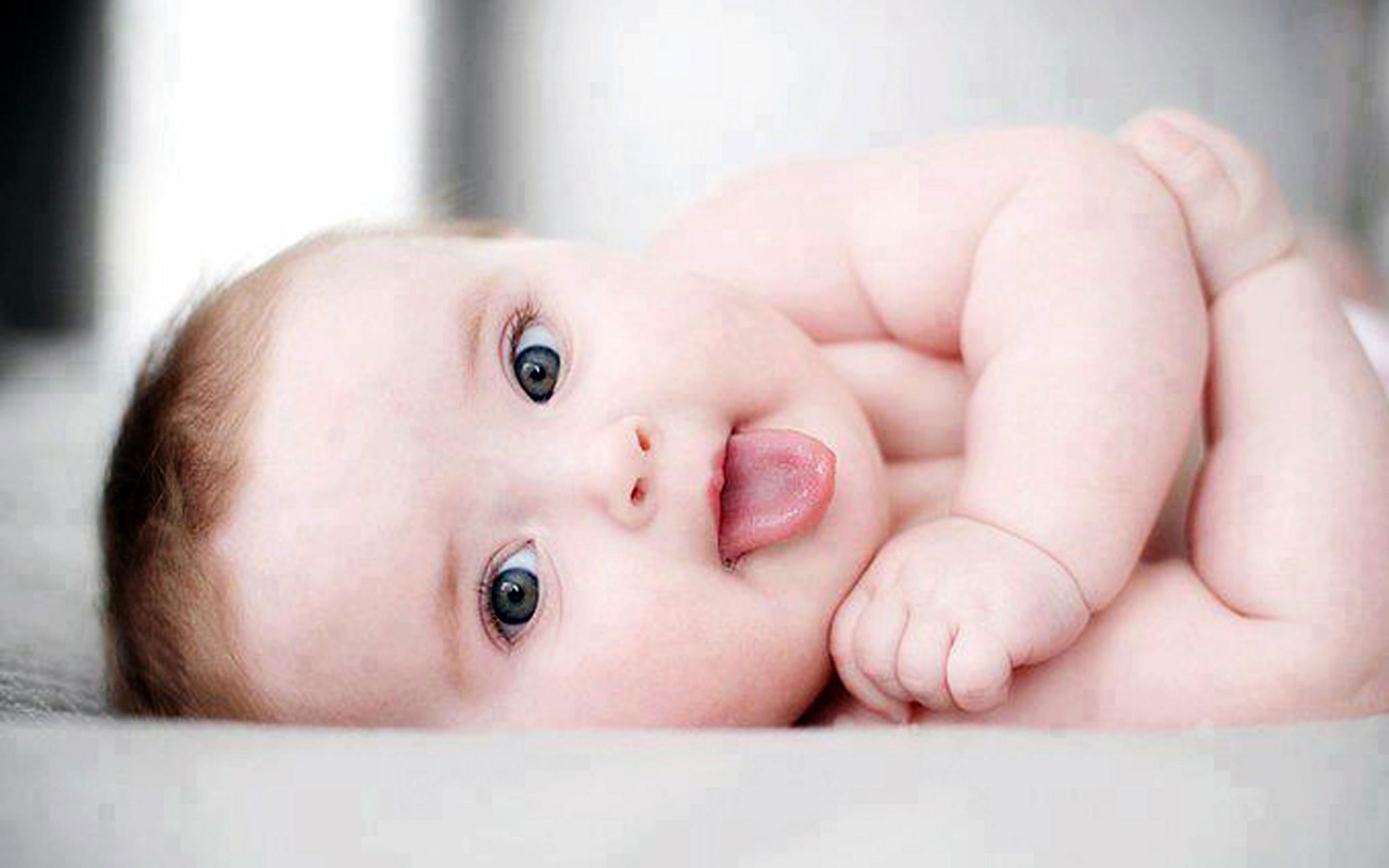 Cute Baby with Tongue out wallpaper