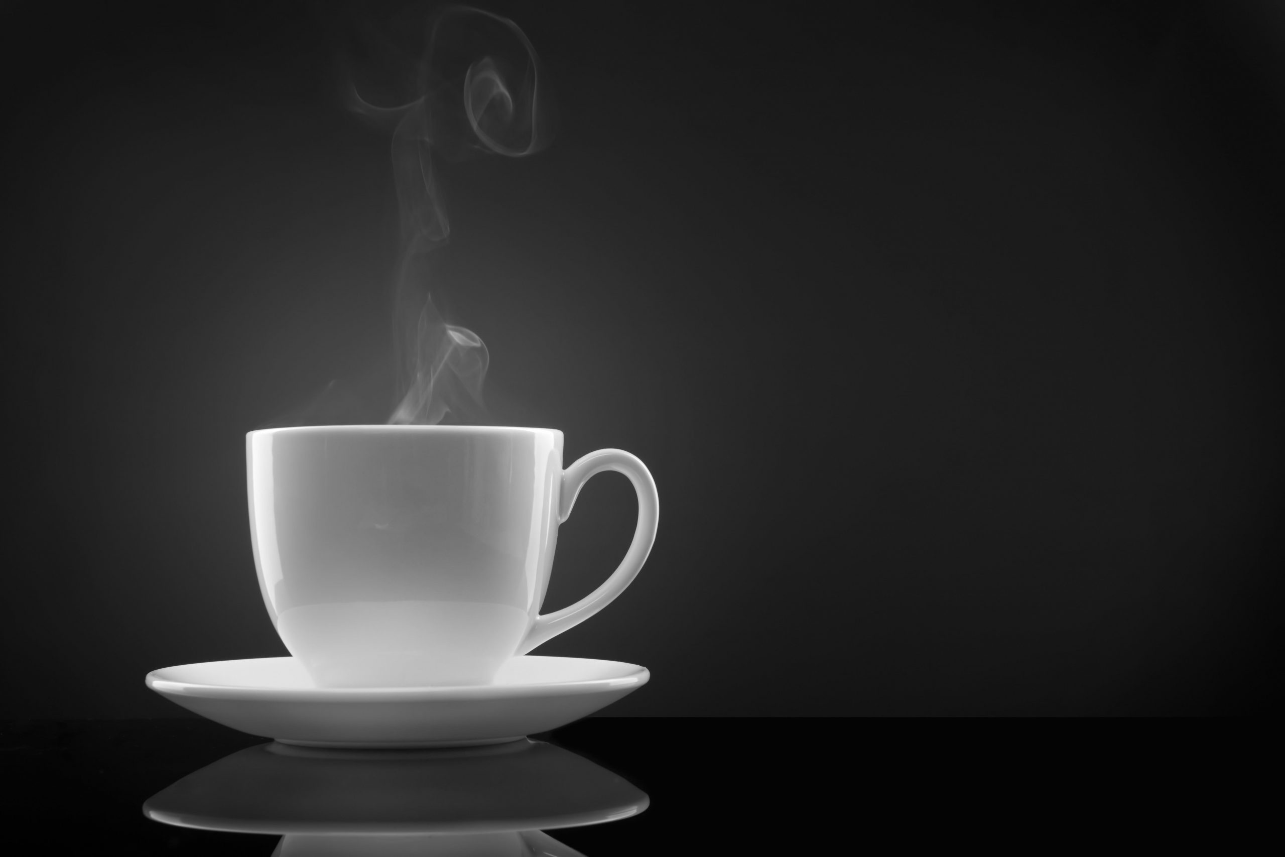 Teacup with saucer wallpaper, coffee, steam, black background