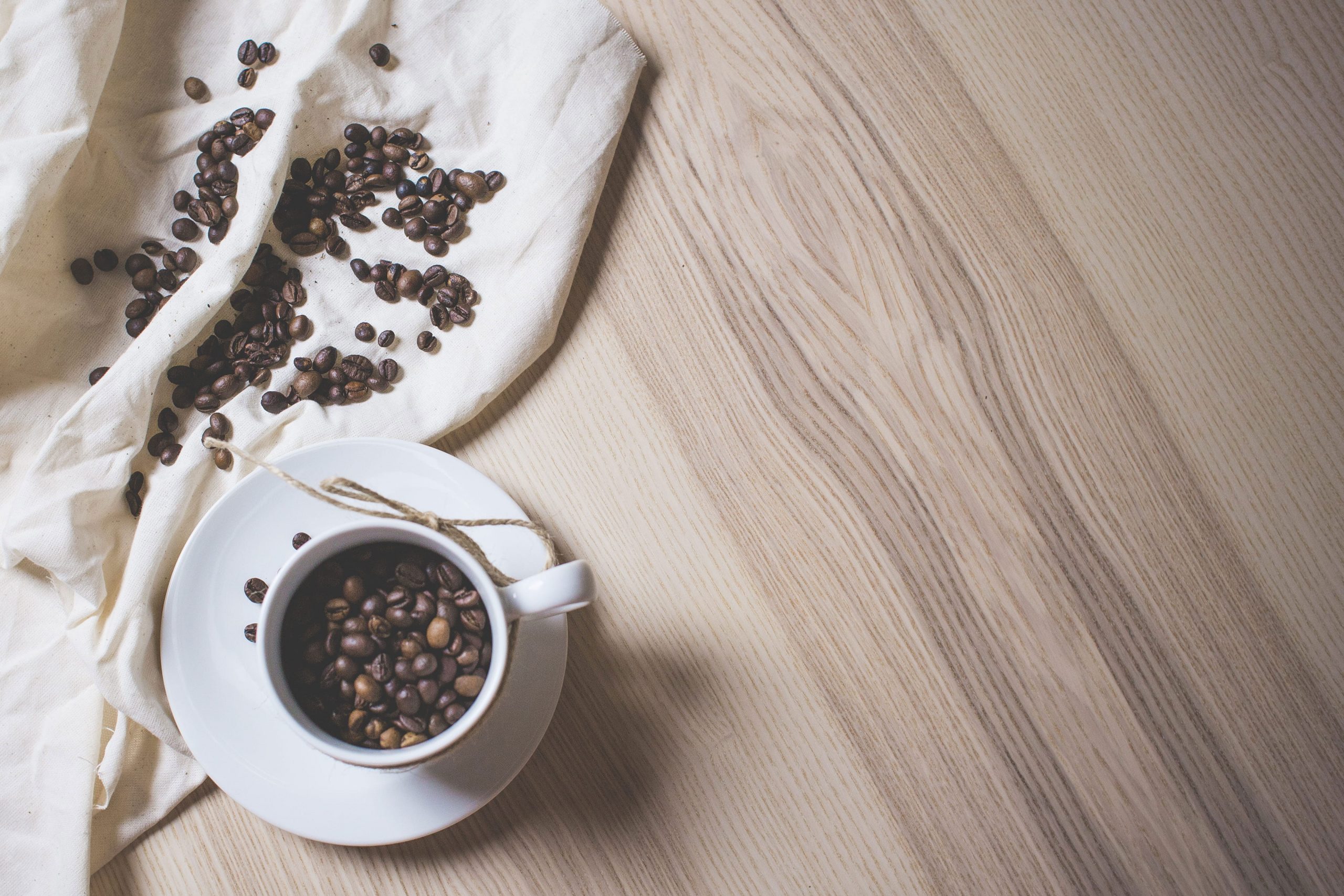 Coffee Beans in a Coffee Cup wallpaper, cafe, desk, foodie, room for text