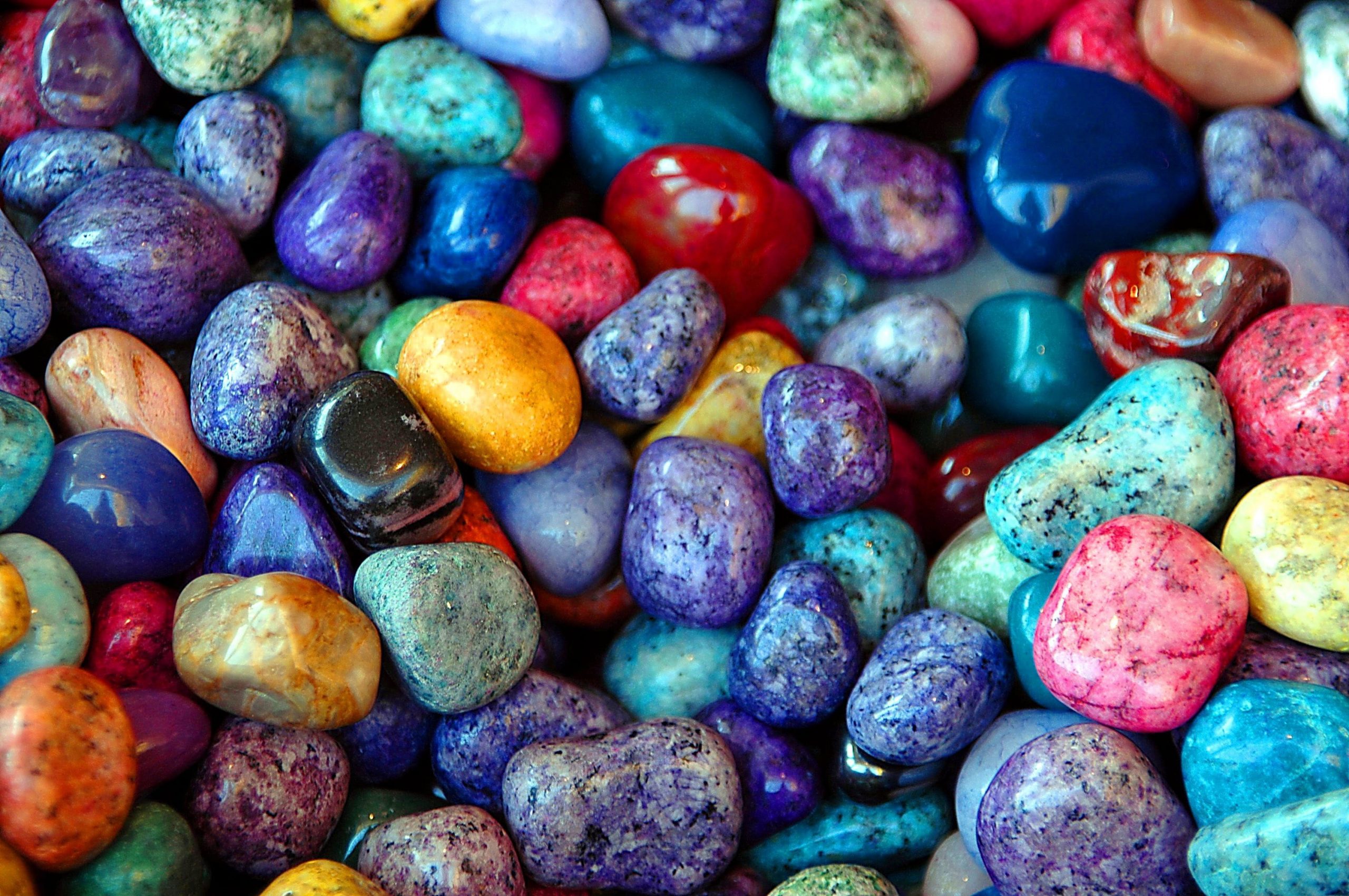 Macro shot of multicolored pebble stones, colorful rocks, background