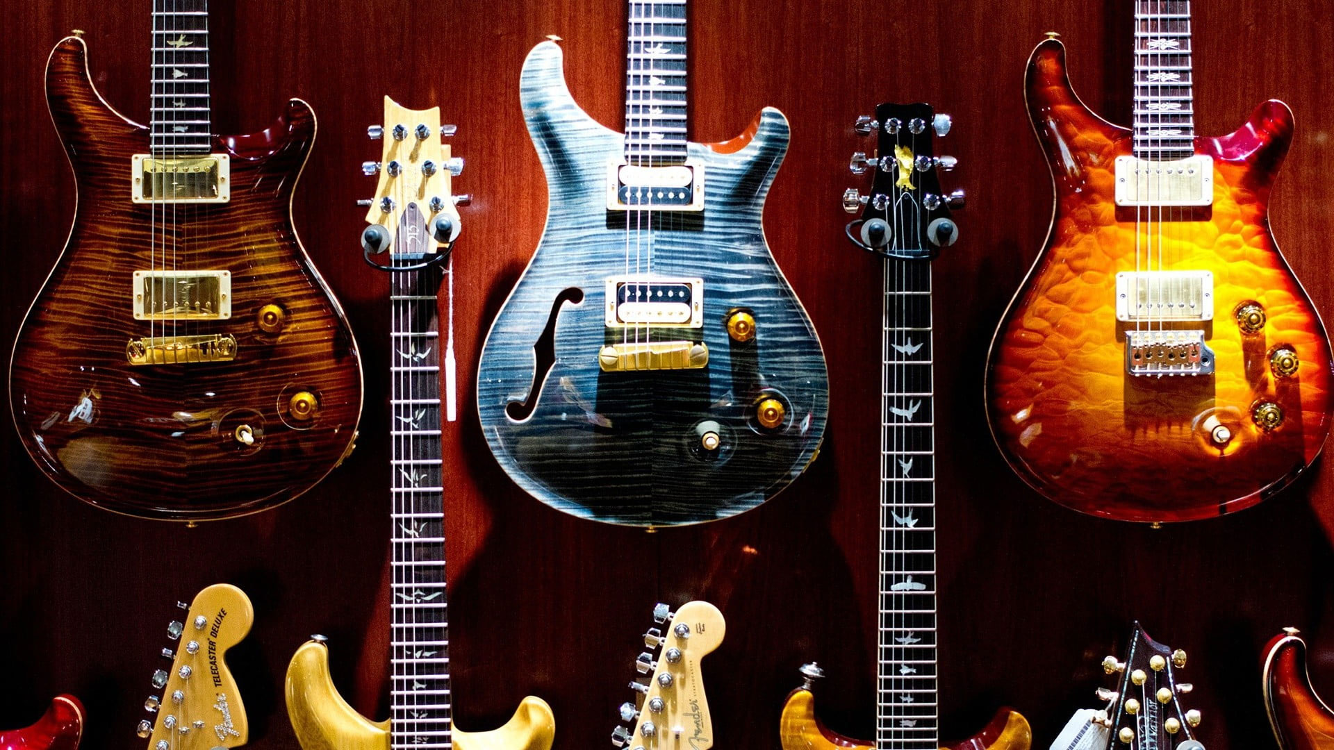 Wallpaper Several Assorted Color Electric Guitars, Colorful